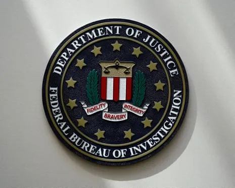 Suspect Sought After Vehicle Crashed into Federal Bureau of Investigation Entrance in Potential Incident of Terror